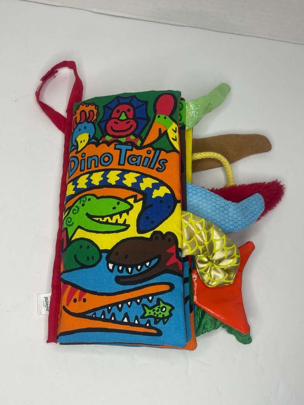 Jellycat Dino Tails Soft Sensory Activity Cloth Book by Anne Wilkinson